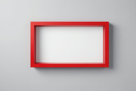 Red frame on a white wall. 3d rendering. Computer digital drawing.の写真素材