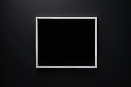 Blank photo frame on black wall background. 3d illustration.の写真素材