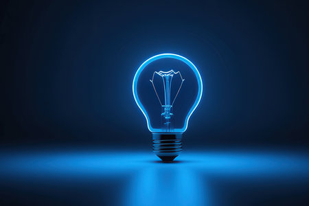 Glowing light bulb on blue background. Idea concept. 3D Renderingの写真素材