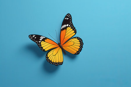 Butterfly isolated on blue background. 3d render illustration.の写真素材