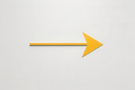Yellow arrow on a white background. 3d rendering. Computer digital drawing.の写真素材