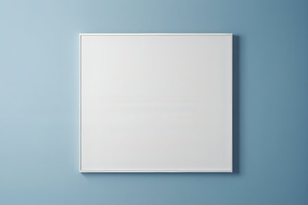 Blank white picture frame on blue wall. 3D Renderingの写真素材