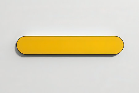 3d rendering of a yellow button on a white background with a shadowの写真素材