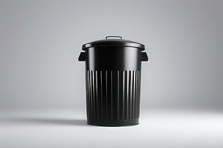 Black trash can isolated on white background. 3D rendering illustration.の写真素材