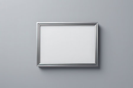 White picture frame on a gray wall. 3d rendering mock upの写真素材