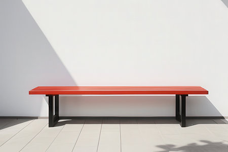 Red bench in the white room with shadow on the wall, stock photoの素材