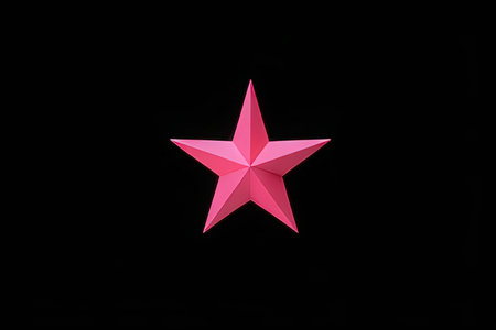 Origami pink star on a black background. Minimal concept.の写真素材