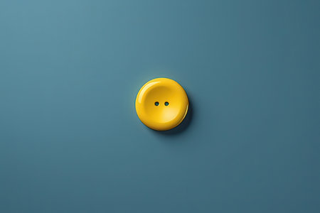 Yellow button on blue background. 3d illustration. Top view.の写真素材