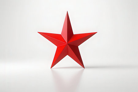 3d rendering of a red star on a white background with reflectionの写真素材