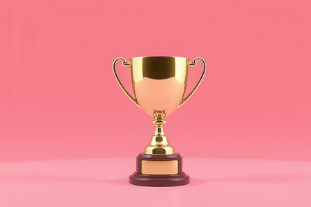 3d rendering of a golden trophy cup on a pink background.
