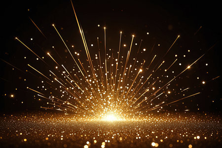 golden glitter particles and bokeh light effects on black backgroundの写真素材