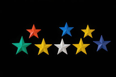 Star rating on black background. Concept of evaluation, ranking and classification.