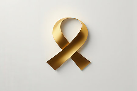 Realistic gold ribbon on white background. Symbol of World Aids Dayの写真素材