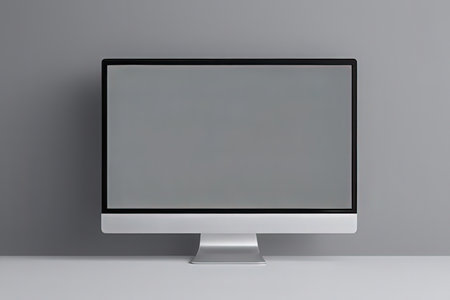 Modern computer monitor with blank screen on gray background. 3d renderの写真素材