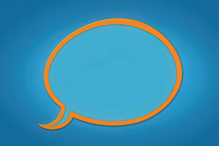 Orange speech bubble isolated on blue background. 3d render. Speech bubble.の写真素材