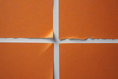 Orange torn paper with space for your message or text on white backgroundの写真素材