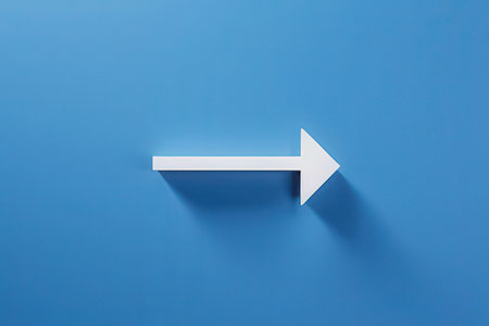 White arrow on blue background. Minimalism concept. 3D Renderingの写真素材