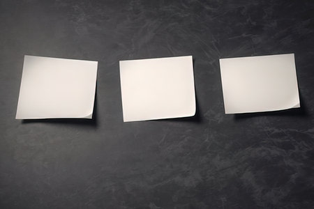 Blank paper sheets on black background. Mockup for branding identity.