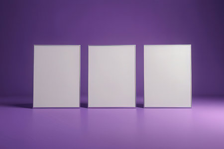 Three blank white vertical posters on a purple background. 3d renderingの写真素材