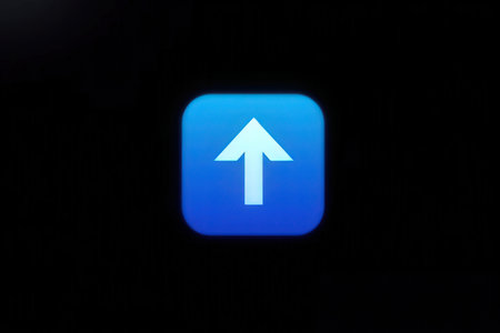 Close-up shot of a blue app icon on a smartphone screenの写真素材