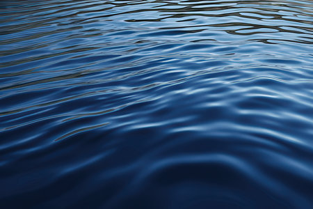 abstract blue water background with some smooth ripples in the water