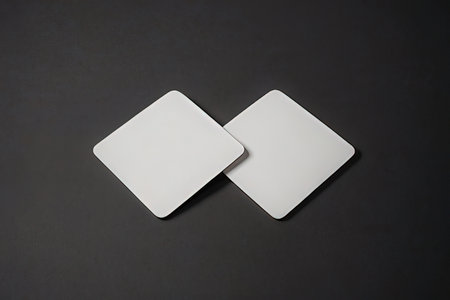 Blank business cards on black background. Mockup for branding identity.の写真素材
