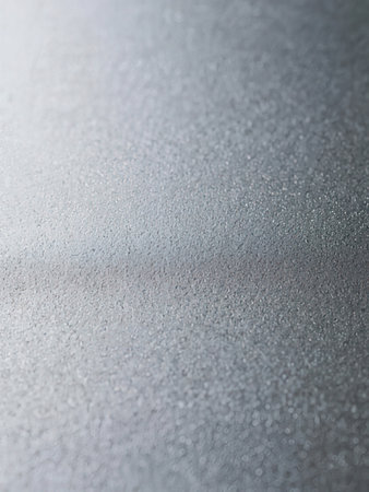 abstract background of water droplets on a glass surface with shallow depth of field