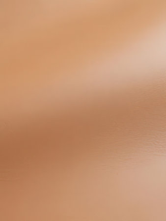 abstract brown background texture with some smooth lines in it and some spots on itの写真素材