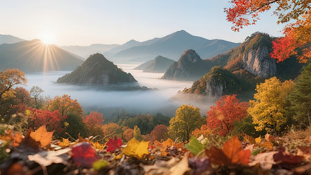 Colorful autumn landscape with foggy forest and mountains at sunrise.の写真素材