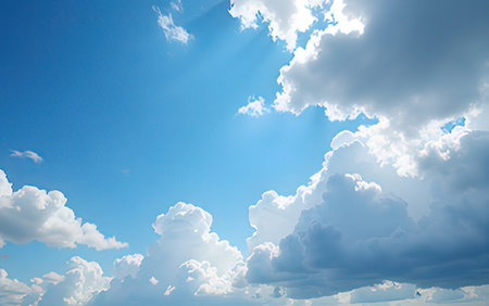 Blue sky background with white clouds. Cumulus white clouds in the blue sky.