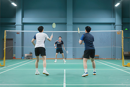 Badminton players in action, badminton court, sportの写真素材