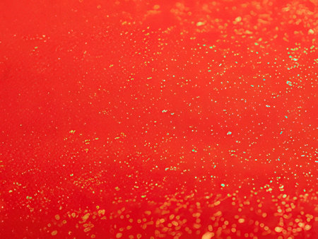 abstract background of red and gold glitter bokeh defocused lights