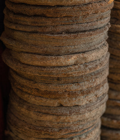 Ceramic tiles stacked on a shelf in a shop in India