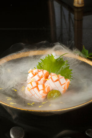 Japanese Sashimi in a hot pot, closeup of photoの写真素材