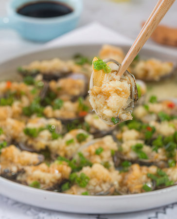 Seafood soup with shrimps and mussels in a bowlの写真素材