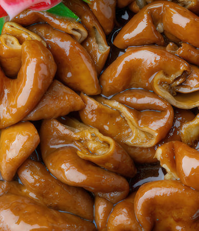 Close-up of salted ginkgo seeds, food background