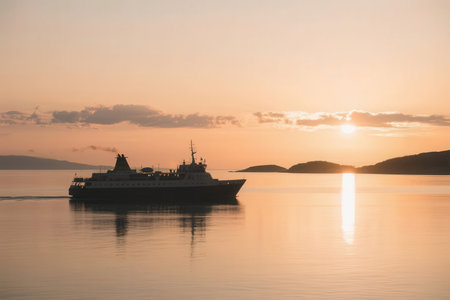 Cruise ship in the sea at sunset. Silhouette of a passenger ship.の素材