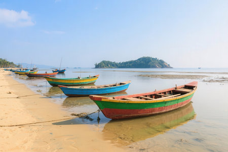 Colorful fishing boats on the beach with blue sky background, Thailandの素材
