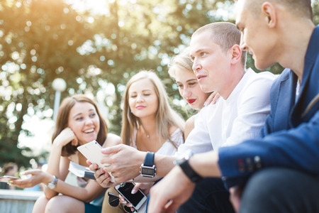 meeting of young people, team of businessmen in nature. Lifestyle, young entrepreneursの写真素材