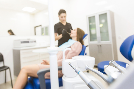 Dental clinic. Reception, examination of the patient. Teeth care. Modern dental equipment.の写真素材