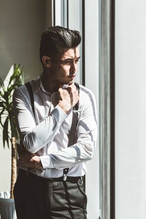portrait of a young purposeful businessman in a suitの写真素材