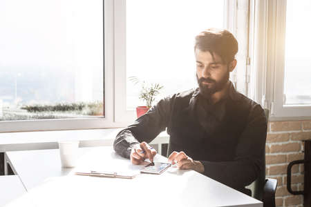 Young businesman in suit wear working in office. Team at work.の写真素材