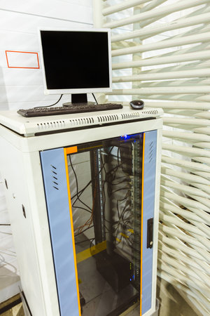 Computer and server in production in a factory. Online and remote production control. Collection and...