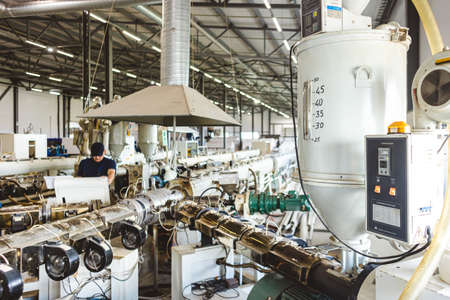 Inside factory. the interior of the equipment used in the polypropylene pipe production line
