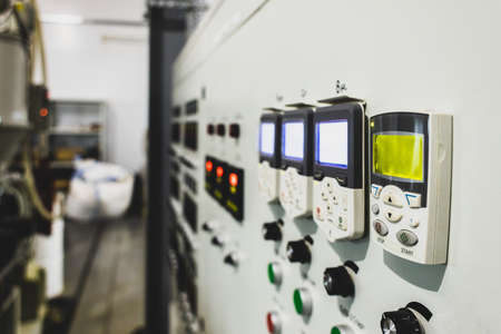 Many button of the machine in the factoryの写真素材