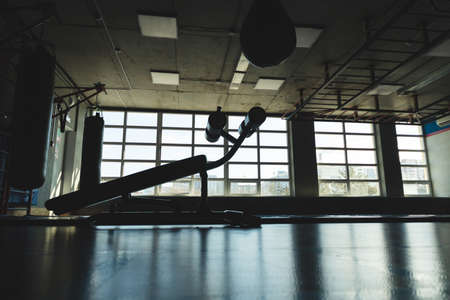 The simulator in the gym opposite the window. The silhouette in front of the windowの写真素材