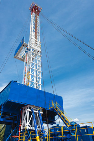 Mobile drilling rig close-up. Drilling and servicing oil and gas wellsの写真素材