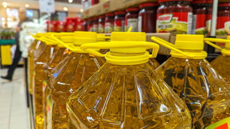 Sunflower oil in bottles on the counter in the supermarketの写真素材