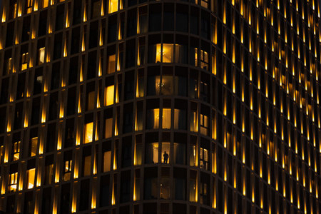 View of the beautifully illuminated facade of the building at nightの写真素材