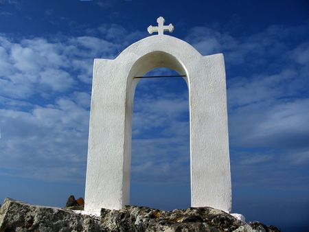 Greek church arch against the skyの写真素材